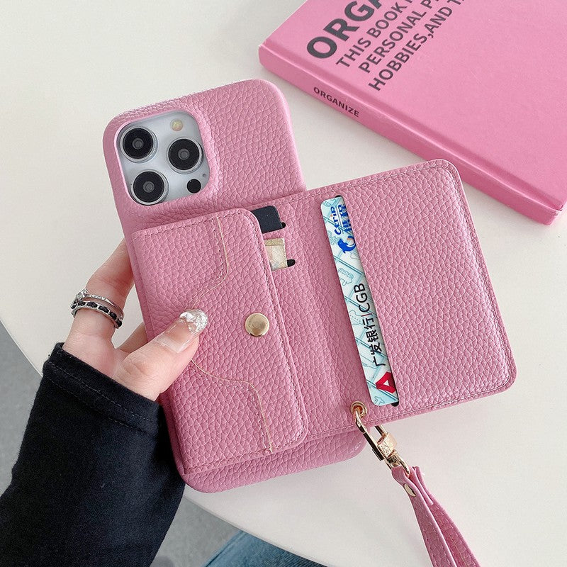 折りたたみスタンドを立てた多機能iPhoneケース