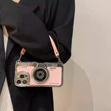 ピンクのレトロカメラ iPhone シリコンケース ハンドストラップ付き