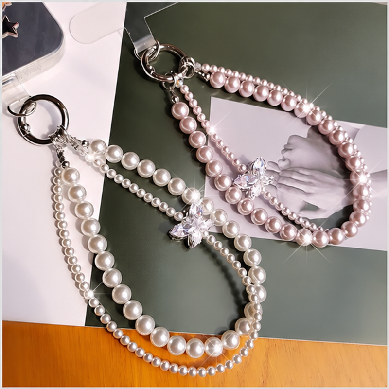 バタフライチャーム付きダブルパール調スマホリストストラップの商品イメージ
